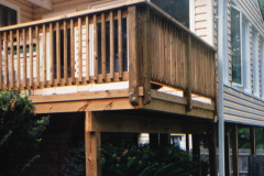 Custom cedar deck railing detail with turned balusters