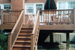 Cedar deck with stairs, balusters, and bistro seating