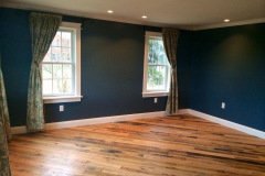 Addition bedroom freshly painted with refinished hardwood floors