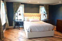 Finished master bedroom addition with custom drapery and trim
